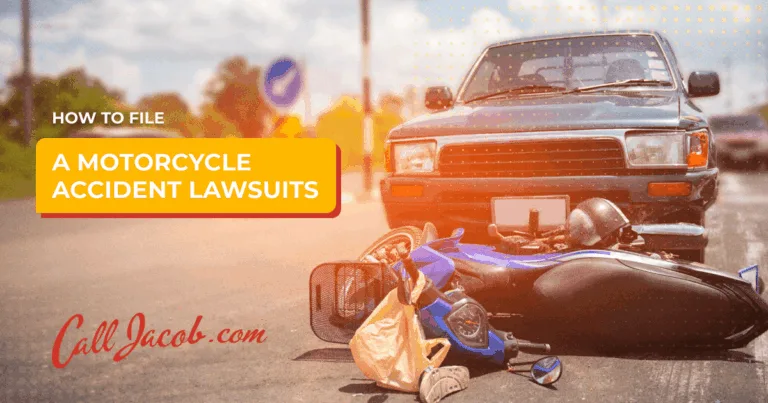 A damaged blue motorcycle lies on its side in front of a car at an intersection, with text overlay: “How to file a motorcycle accident lawsuits. CallJacob.com.” The image suggests personal injury attorney services for accident victims.