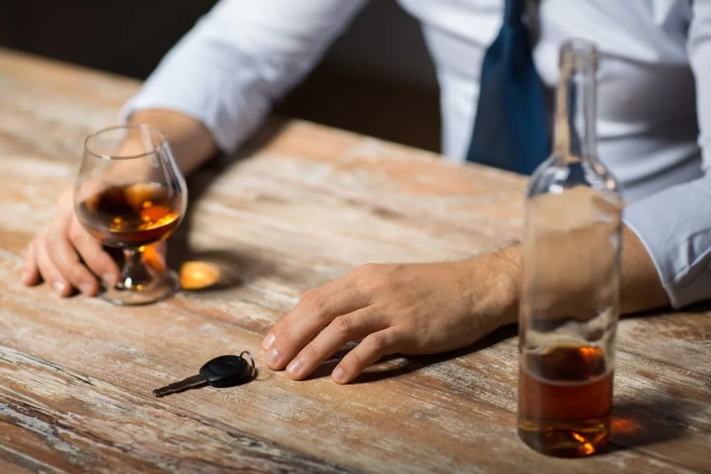 Man Drinking at Bar