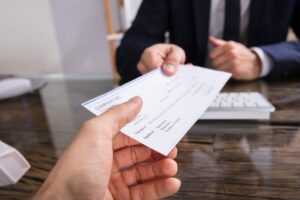 insurance-handing-check