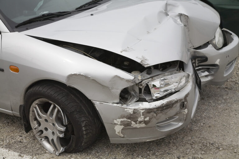 front of smashed automobile