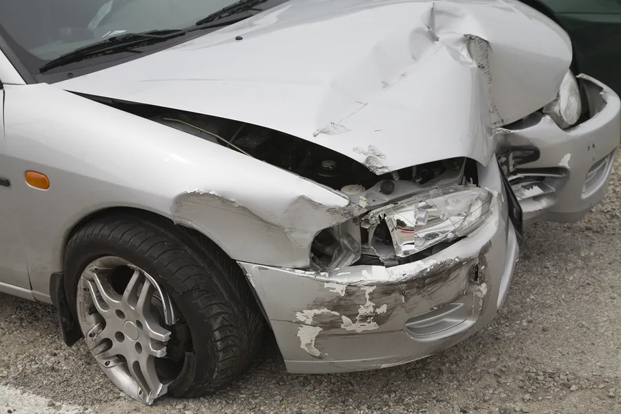 front of smashed automobile