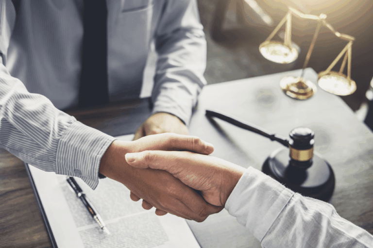 handshake over a gavel