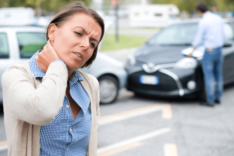 woman with neck pain after car accident