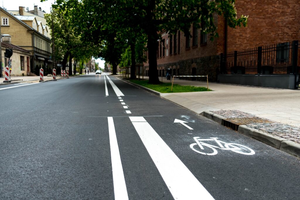 A selective focus of a freshly paint bicycle lane on the side of a street