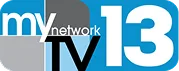 Logo featuring the words “my network TV 13” in white and black text on a blue, gray, and white background with overlapping rectangles.