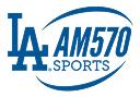 Blue "LA" logo next to text "AM570 SPORTS" with a curved line encircling the text, representing a sports radio station.