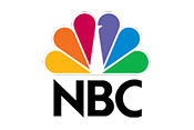The NBC logo featuring a colorful peacock with six feathers in red, orange, yellow, green, blue, and purple above the bold, black letters "NBC" on a light background.