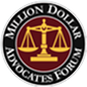A circular logo with a gold balance scale in the center on a maroon background, surrounded by a black border with the words “Million Dollar Advocates Forum” in white capital letters.