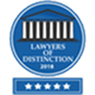 A blue circular badge with a white courthouse icon and the text “Lawyers of Distinction 2018.” Below the circle is a blue rectangle featuring four white stars.